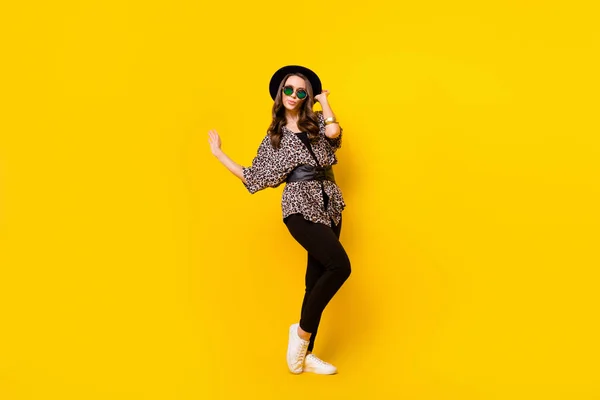 Full body photo of glamour attractive nice young woman wear luxury outfit look empty space isolated on yellow color background — Stock Photo, Image