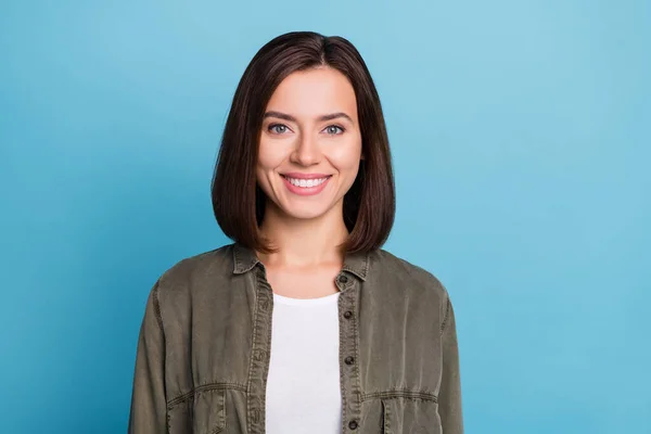 Photo of satisfied charming lovely lady toothy smiling wear grey outfit isolated over blue color background — Stockfoto