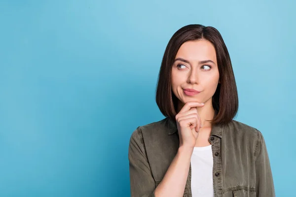 Photo of minded lady think thought touch chin hand wear khaki outfit isolated over blue color background — Stockfoto
