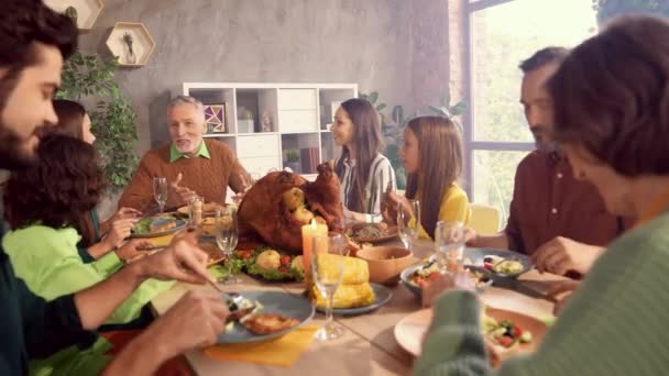 Glad nice family sit table enjoy holiday dinner — Stock Video