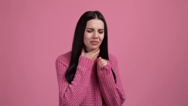 Sad lady suffer covid epidemic sick cough isolated pink color background — Stock Video