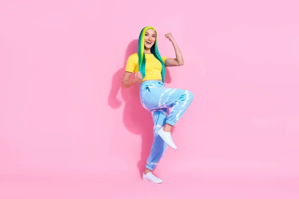 Full size photo of cheerful young lady raise fists in victory achievement triumph isolated on pink color background — Stock Photo, Image