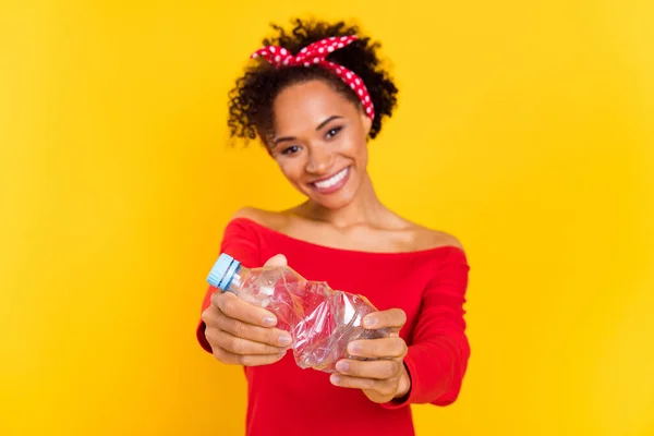 Photo of cheerful lady hold empty plastic bottle sorting concept wear pin-up outfit isolated yellow color background — Stock Photo, Image