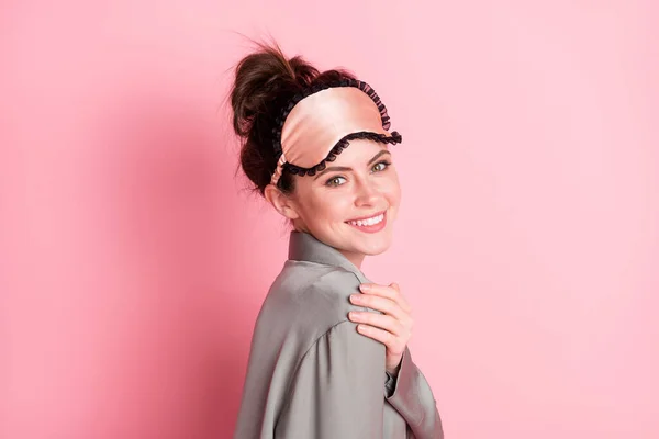 Profile side view portrait of attractive cheerful girl wearing pajama isolated over pink pastel color background — Stock Photo, Image