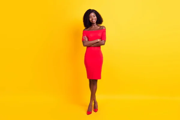 Full size photo of young happy positive gorgeous stunning afro girl with folded hands isolated on yellow color background — Stock Photo, Image