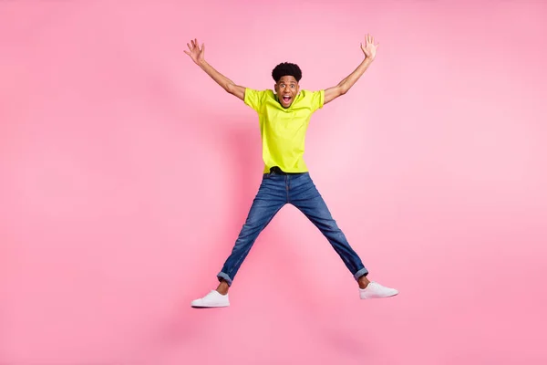 Full length body size view of attractive cheerful amazed guy jumping fooling isolated over pink pastel color background — Stock Photo, Image