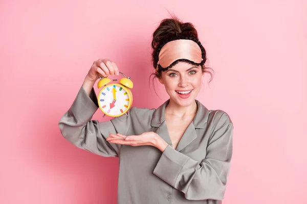 Photo of young girl happy positive smile show timer clock watch punctuality isolated over pink color background — Stock Photo, Image