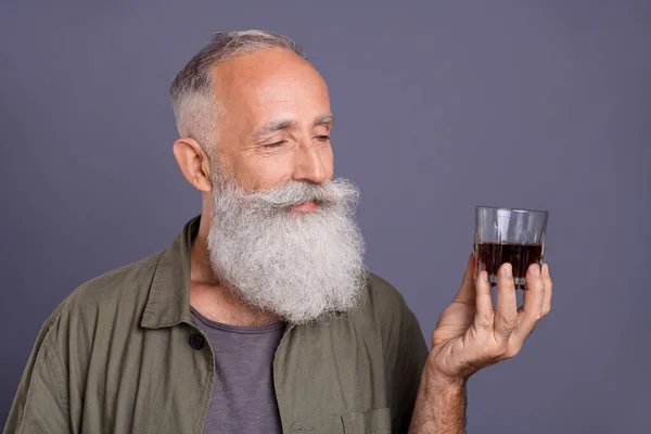 Photo of senior man degustate bourbon sommelier drink alcohol event isolated over grey color background — Stock Photo, Image