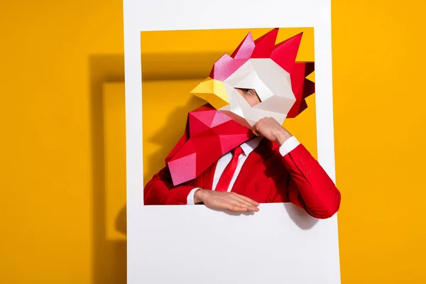 Foto van minded pensive guy in snapshot foto kijken lege ruimte dragen haan masker rood smoking geïsoleerde gele kleur achtergrond — Stockfoto
