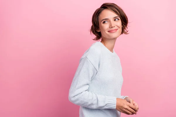 Photo of charming happy positive nice young woman look empty space enjoy smile isolated on pink color background — Stock Photo, Image