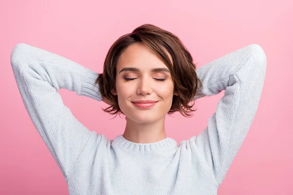 Top above high angle view photo of happy positive young woman sleep hands behind head isolated on pink color background — 图库照片