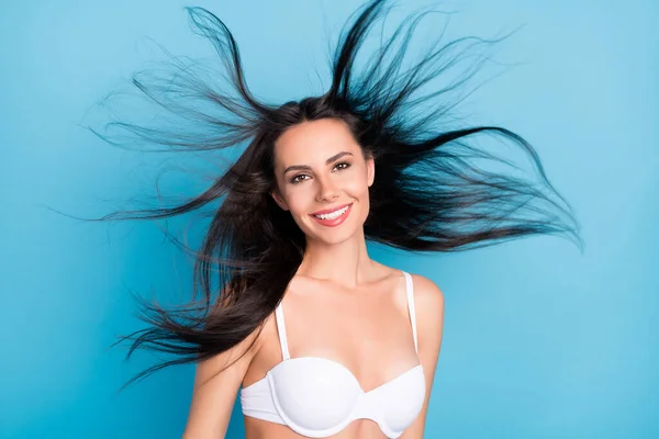 Photo of positive brown hairdo cute lady air blow wear white bra isolated on blue color background — Stockfoto