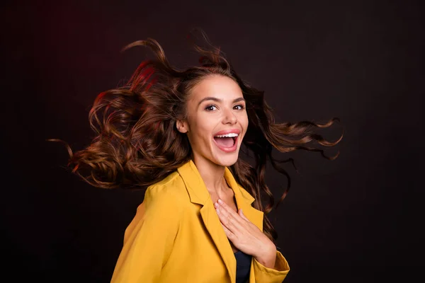 Photo of hooray millennial brunette lady open mouth wear yellow jacket isolated on dark color background — Stock Photo, Image