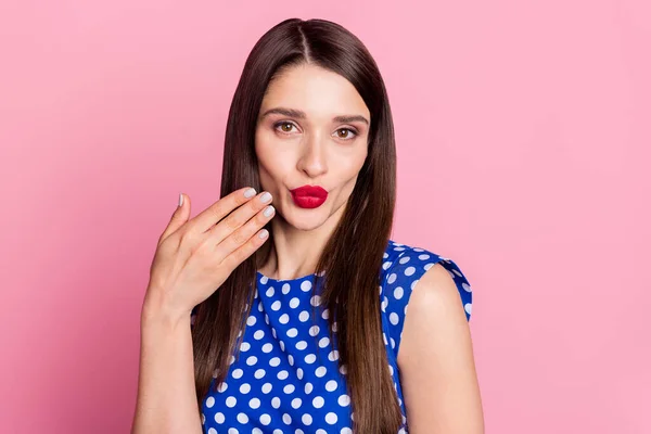 Photo of young adorable woman pouted lips send air kiss flirty romantic isolated over pink color background — 图库照片