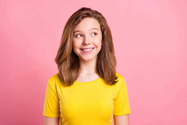 Photo of young cheerful girl happy positive smile think curious look empty space isolated over pink color background — Stockfoto
