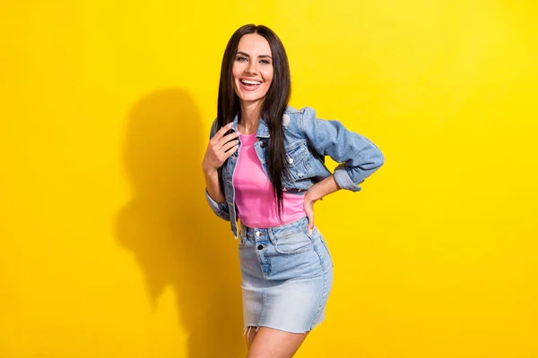 Portrait of attractive cheerful girl laughing having fun funny joke good mood isolated over bright yellow color background — Foto Stock