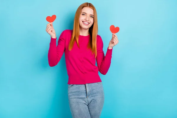 Photo of young millennial foxy head lady hold hearts wear pink sweater jeans isolated on blue color background — Fotografia de Stock