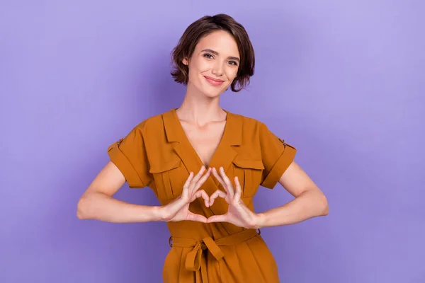 Photo of young woman happy positive smile show fingers heart sign love feelings isolated over violet color background — Stockfoto