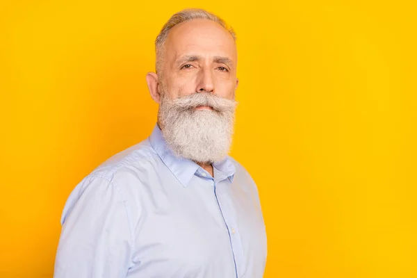 Photo of serious calm imposing old grandfather wear formalwear shirt isolated on yellow color background — Stockfoto