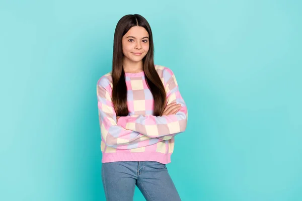 Photo of shiny charming girl wear pink sweater empty space arms folded isolated turquoise color background — Stockfoto