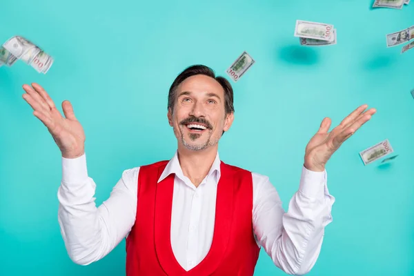 Photo of excited cheerful handsome man enjoy fall money rich look empty space isolated over teal color background — Stok fotoğraf