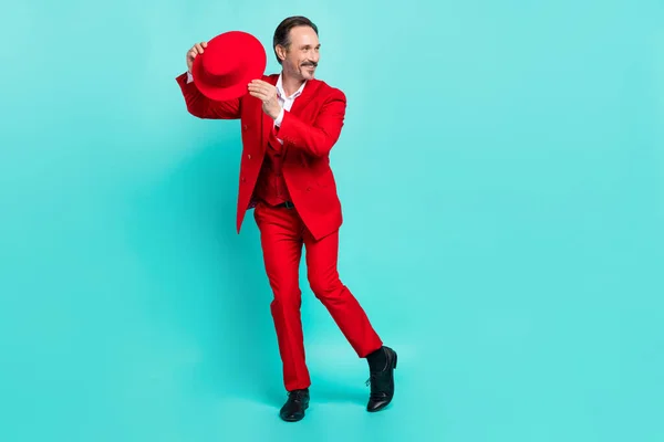 Full length photo of aged cheerful man have fun dance look empty space isolated over turquoise color background — Photo