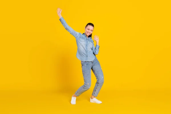 Full length body size photo smiling girl laughing dancing at party on weekend isolated vibrant yellow color background — Stock Fotó