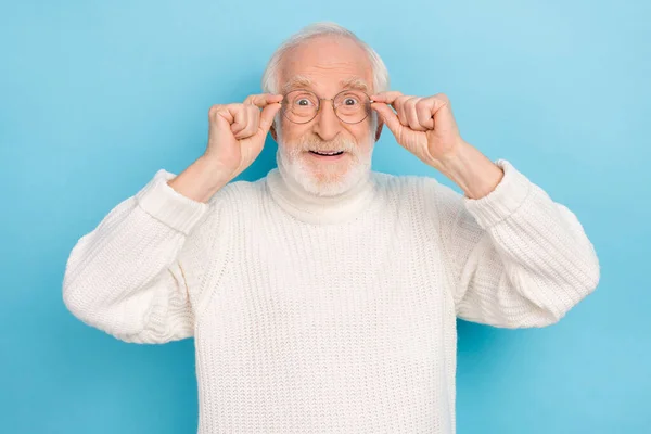 Portrait of attractive cheery funny amazed grey-haired man touching specs health care isolated over bright blue color background — Φωτογραφία Αρχείου