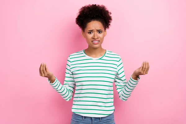 Photo of stressed curly hairstyle young lady ask wear striped shirt isolated on pink color background — Stockfoto