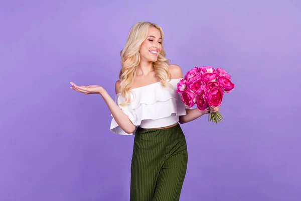 Photo of elegant lady hold bouquet peonies wear white blouse off-shoulders isolated violet color background — Stok fotoğraf