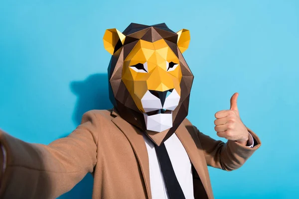 Portrait of weird authentic guy in lion mask make selfie enjoy crazy festival show thumbup symbol isolated over blue color background — Stock Photo, Image