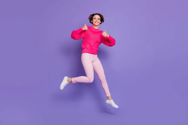 Full body photo of cheerful girl have fun show two thumbs up wear trousers shoes isolated on violet color background — Stock Photo, Image