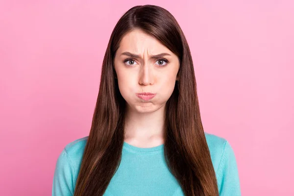 Photo of unhappy young stressed woman hold breath cheeks face isolated on pastel pink color background — Stock Photo, Image