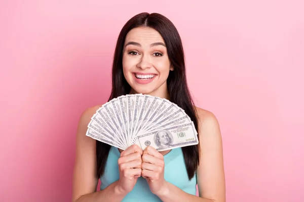 Photo of rich millennial lady show money wear blue top isolated on pink color background — Stock Photo, Image