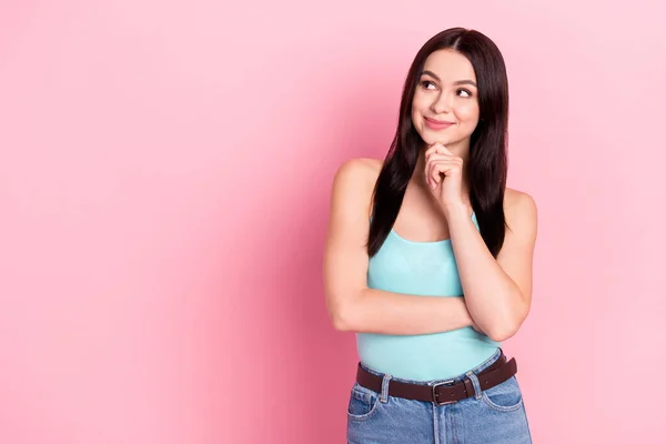 Photo of young attractive girl happy positive smile hand touch chink dream think look empty space isolated over pastel color background — Stock Photo, Image