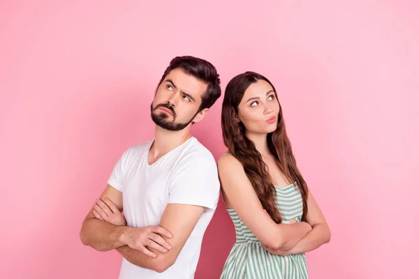 Photo of unsure millennial brown hair couple crossed arms look wear white t-shirt dress isolated on pink color backgound