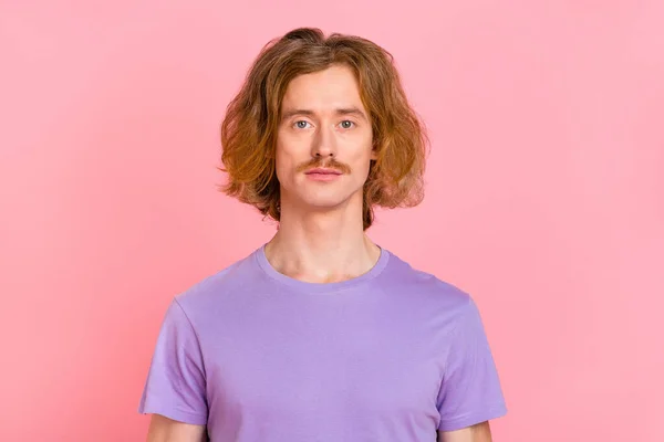 Portrait of attractive content serious red-haired guy wearing tshirt isolated over pink pastel color background — Stock Photo, Image