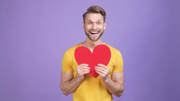Generous guy cuddle 14 february postcard isolated bright color background — Stock Video