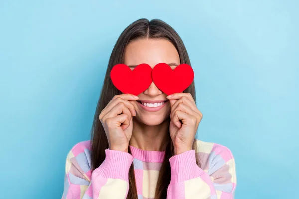 Photo of shy lady hold two little heart hide eyes blind date concept wear casual clothes isolated blue color background — Stock Photo, Image