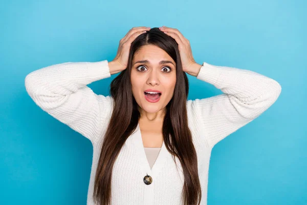 Photo of stressed young lady hands face yell wear white pullover isolated on blue color background — Stock Photo, Image