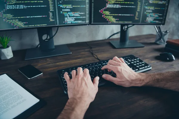 First point view cropped photo of designer guy typing start-up project web content development sit desk in modern loft workspace — Stock Photo, Image