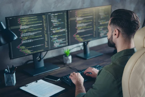 Photo of focused designer editor work device start-up write modify information maintenance in modern loft workspace — Stock fotografie