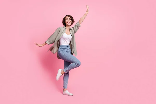 Full body photo of dynamic lady dancing discotheque music lover raise arms up isolated pastel color background — Stock Photo, Image