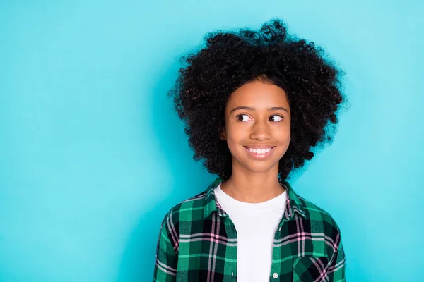 Photo of dreamy inspired little lady look side empty space wear checkered shirt isolated turquoise color background — Stock Photo, Image