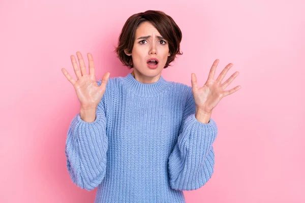 Photo of impressed scared person raise arms palms open mouth stare speechless isolated on pink color background — стоковое фото