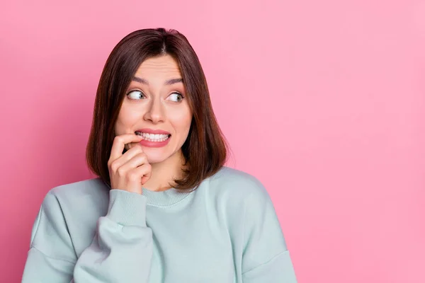 Photo of young pretty girl worried look empty space failure anxious isolated over pink color background — 스톡 사진