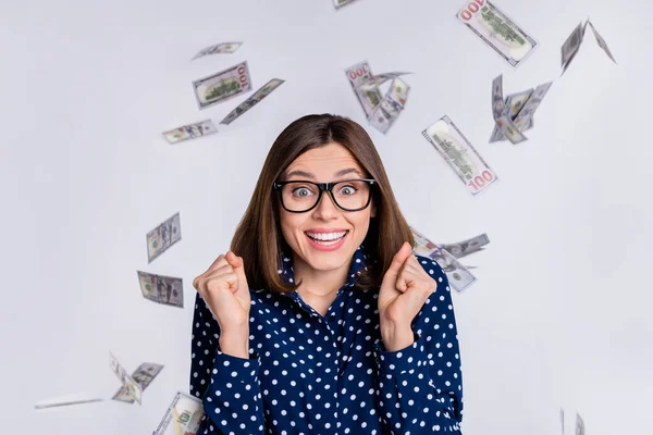 Photo of delighted positive girl raise fists celebrate success lottery jackpot isolated on grey color background — Stock Photo, Image