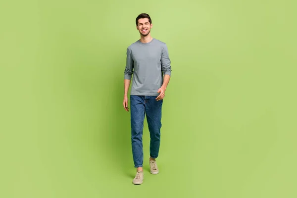 Full body photo of handsome positive male go on walk romantic date with girlfriend isolated on green color background — Stock Photo, Image