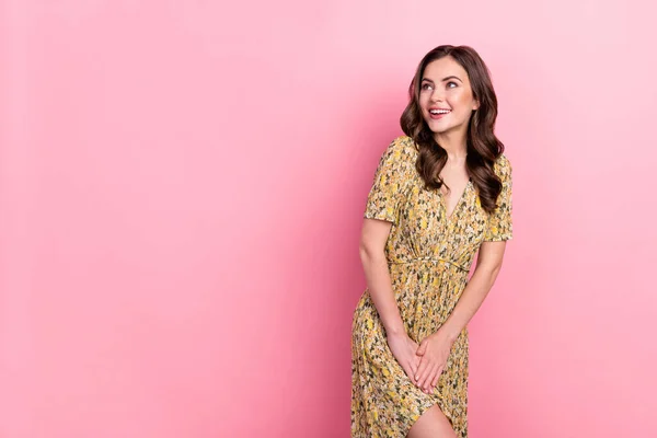 Portrait of satisfied adorable person look interested empty space isolated on pink color background — ストック写真