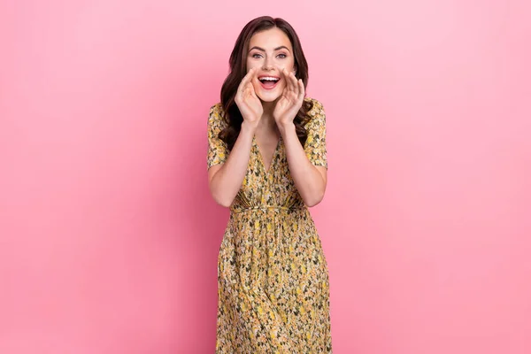 Photo of cute young brunette lady say secret wear floral dress isolated on pink color background — Foto de Stock